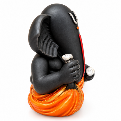 Black Ganesha Idol with Orange Dhoti, Resin Statue for Home Decor